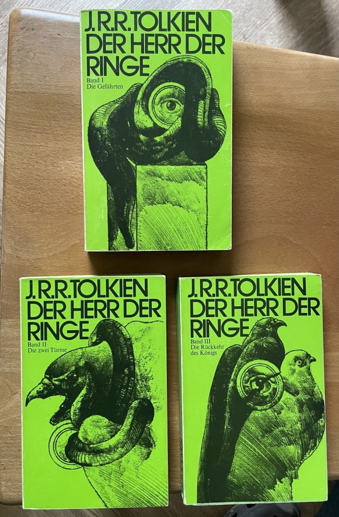 Buch: die grüne Paperbackausgabe des Herrn der Ringe.