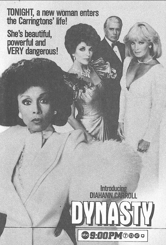 Diahann stairs at the viewer while the rest of the cast stand in the back. 