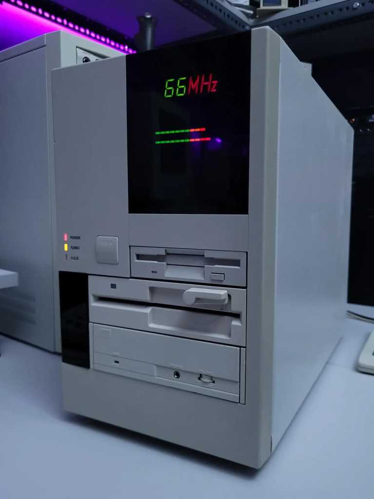 A very nice looking tower PC with LCD speed display for the speed reading "66 MHz"