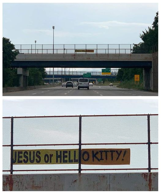 A sign on a bridge saying "Jesus or Hell, but with a continuation of the sign added to say "o kitty"