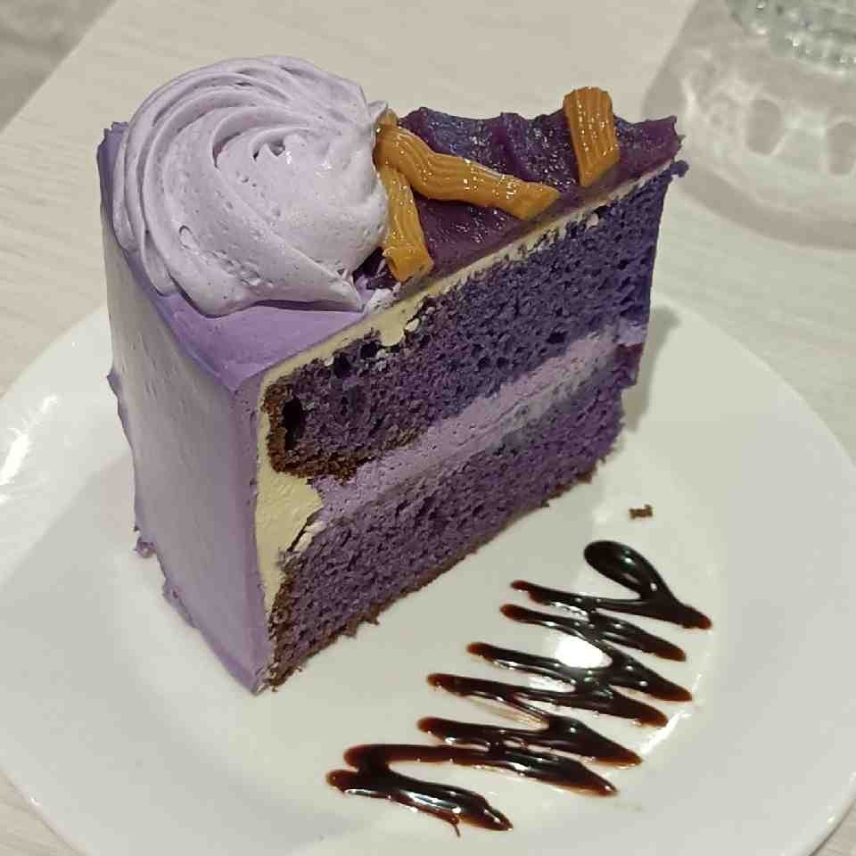 Photo of a slice of Ube Tres Leches cake 