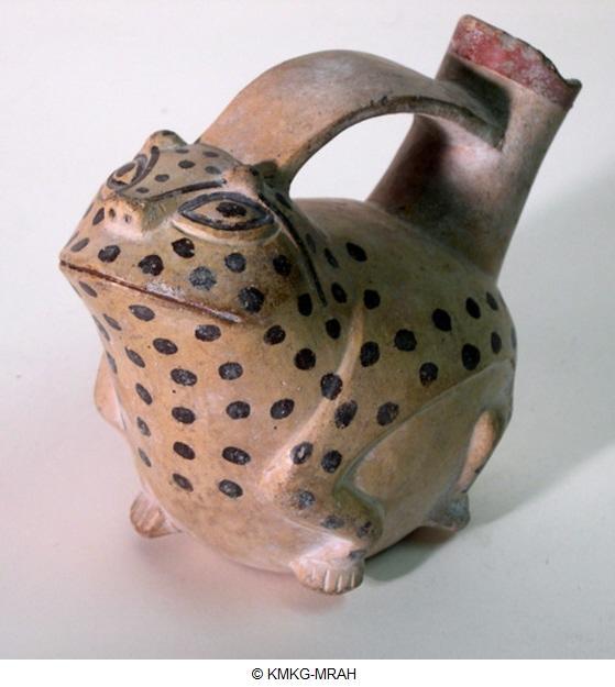 official museum photo of the object, quarter turn side profile on white background: single spout terracotta vase, effigy vessel in the form of a frog with black spots, traces of red paint on top of spout