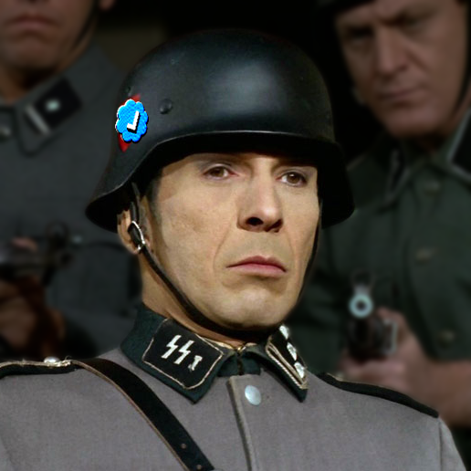 Spock wearing Nazi helmet with a Twitter logo on it
From Patterns of Force