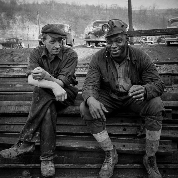 Black and white photograph of black and white American coal miners in the 1930s.