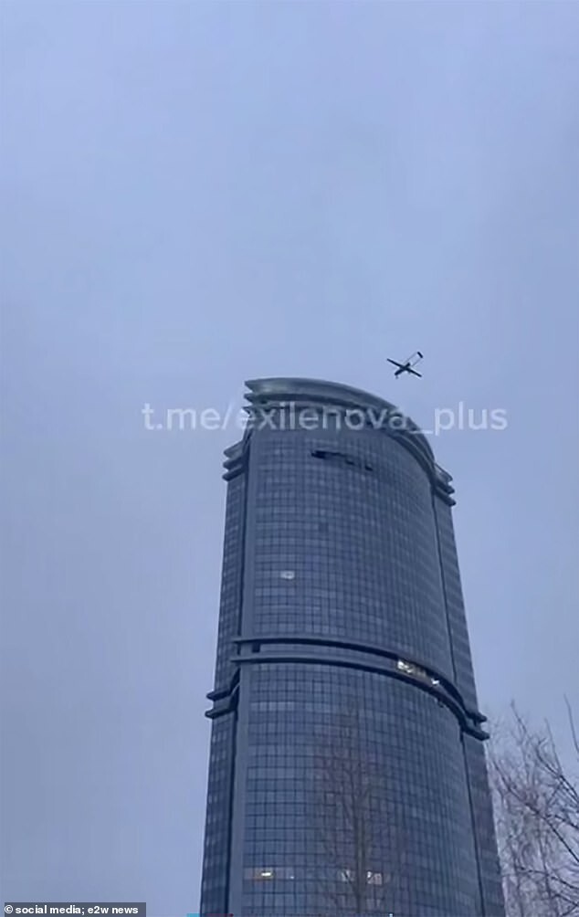 Dramatic pictures show the deadly weapon – thought to be a long-range Liutyi or 'Fierce' drone with a 50 kg warhead – smashing into the upper floors of the city's tallest building