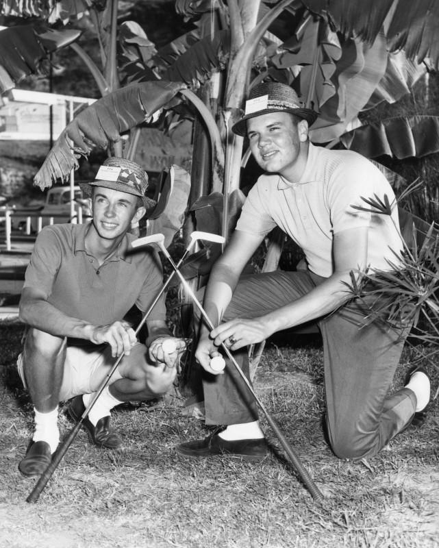 Photograph caption dated August 28, 1961 reads "Condy Robertson [sic] of Savanah [sic], Ga., right, won the $4,000 Pacific Open putters golf tournament yesterday with a score of 253, taking it on a hole-in-one clincher on the final hole. His ace gave him victory over Neil Connor of Greenville, S.C., left, who finished with 254. Connor is putt putt money leading with $5,085. Roberson has won $3,482."