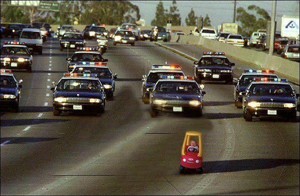 Toddler trying out run the cops.