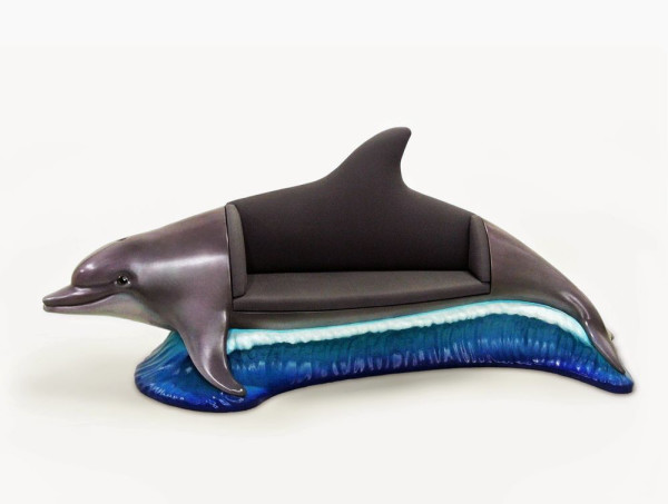 A couch that’s shaped like a dolphin