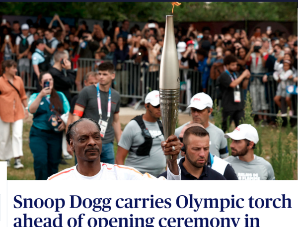 AP: Snopp Dogg carries Olympic torch ahead of opening ceremony