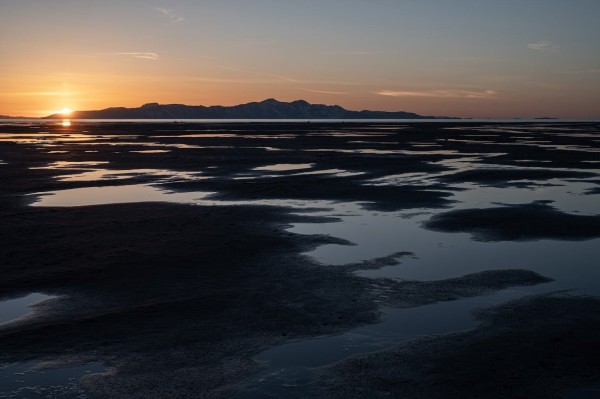 The Great Salt Lake isn’t just drying out. It’s warming the planet. | The Great Salt Lake released 4.1 million tons of carbon dioxide and other greenhouse gases in 2020, researchers found — more evidence that dried-out lakes are a significant source of emissions.