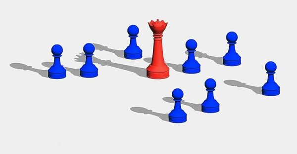 Image of a red chess king surrounded by blue pawns