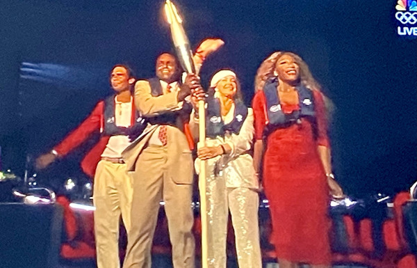 Rafael Nadal, Carl Lewis, Nadia Comaneci & Serena Williams with the torch on the Seine. 