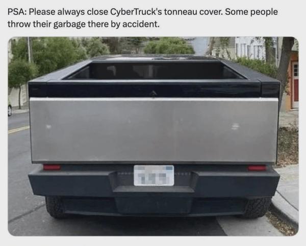 A picture of a CyberTruck from the rear with text saying "PSA: Please always close CyberTruck's tonneau cover. Some people throw their garbage there by accident."