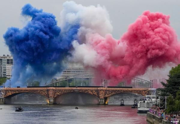 📷 Smoke in the colors of the French flag are set off Friday in Paris, France, at the start of the opening ceremony for the 2024 Summer Olympics.

https://www.voanews.com/a/flooding-rains-threaten-to-dampen-paris-olympics-opening-ceremony/7714213.html