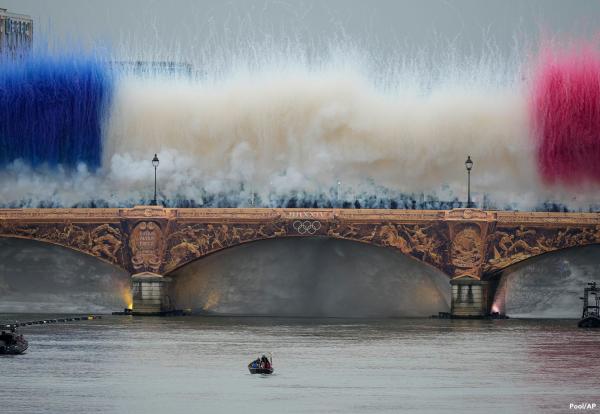 📷 Smoke in the colors of the French flag are set off Friday in Paris, France, at the start of the opening ceremony for the 2024 Summer Olympics.

https://www.voanews.com/a/flooding-rains-threaten-to-dampen-paris-olympics-opening-ceremony/7714213.html