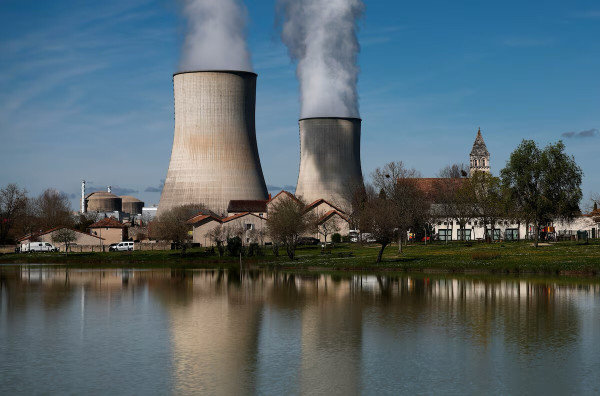 Steam rises from cooling towers of the Electricite de France (EDF) nuclear power station in Civaux, France, March 19, 2024. REUTERS/Stephane Mahe/