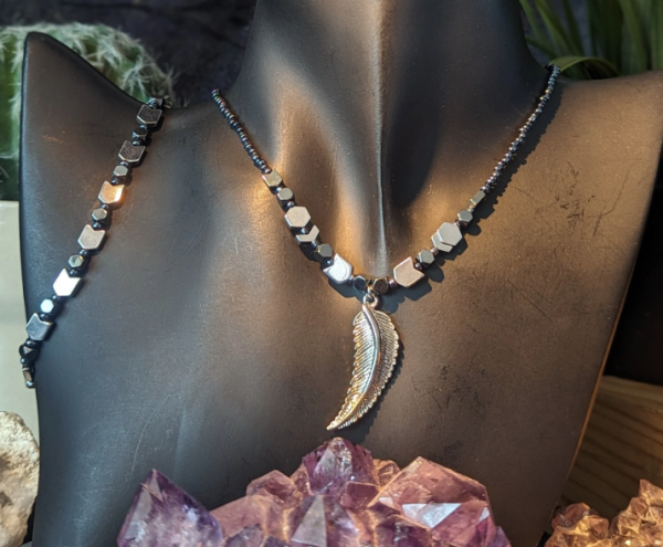 handmade necklace with silver feather pendant, silver arrow beaded necklace and bracelet with hematite styled beads
