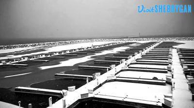 Rotating view of Harbor Center Marina along Lake Michigan. // Image captured at: 2024-12-19 19:30:45 UTC (about 2 min. prior to this post) // Current Temp in Sheboygan: 28.71 F | -1.83 C // Precip: light snow // Wind: ESE at 5.749 mph | 9.25 kph // Humidity: 85%