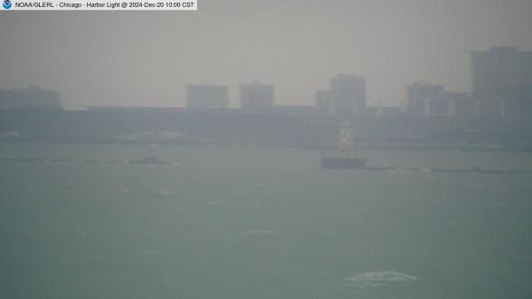 View of the Chicago Harbor Lighthouse from one of the cribs located in Lake Michigan. // Image captured at: 2024-12-20 16:00:01 UTC (about 3 min. prior to this post) // Current Temp in Chicago: 34.89 F | 1.61 C // Precip: overcast clouds // Wind: NNE at 8.008 mph | 12.88 kph // Humidity: 74%