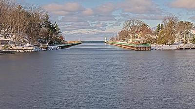 View looking west from Pentwater Yacht Club through Pentwater River into Lake Michigan. // Image captured at: 2024-12-20 17:11:06 UTC (about 21 min. prior to this post) // Current Temp in Pentwater: 29.79 F | -1.23 C // Precip: broken clouds // Wind: NNE at 8.008 mph | 12.88 kph // Humidity: 84%