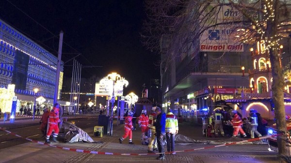 Car drives into group of people at Christmas market in Magdeburg, driver arrested.