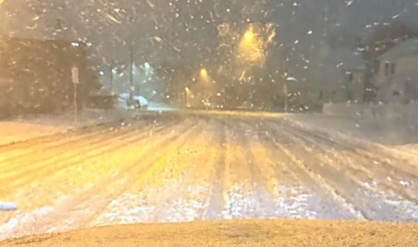 Snow-covered Gallivan Boulevard this evening