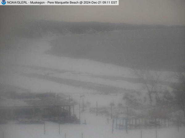 Wide view of Pere Marquette Beach in Muskegon with a beach house in the foreground. // Image captured at: 2024-12-21 14:11:01 UTC (about 22 min. prior to this post) // Current Temp in Muskegon: 23.74 F | -4.59 C // Precip: overcast clouds // Wind: NNE at 6.912 mph | 11.12 kph // Humidity: 69%