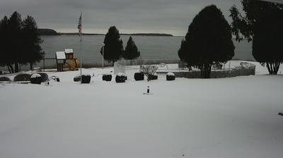 View of a playground and flagpole in foreground that overlooks Sturgeon Bay and Lake Michigan. // Image captured at: 2024-12-21 18:09:14 UTC (about 23 min. prior to this post) // Current Temp in Sturgeon Bay: 19.58 F | -6.90 C // Precip: overcast clouds // Wind: NNW at 8.053 mph | 12.9 kph // Humidity: 73%