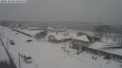 NE view of neighborhood and the BVI ferry dock in Beaver Island that backs up into Lake Michigan. // Image captured at: 2024-12-23 16:54:45 UTC (about 8 min. prior to this post) // Current Temp in Beaver Island: 33.99 F | 1.11 C // Precip: snow // Wind: S at 16.799 mph | 27.03 kph // Humidity: 100%