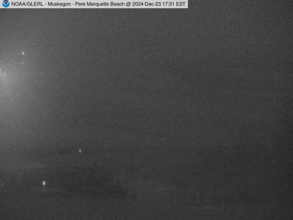 Wide view of Pere Marquette Beach in Muskegon with a beach house in the foreground. // Image captured at: 2024-12-23 22:51:01 UTC (about 12 min. prior to this post) // Current Temp in Muskegon: 36.42 F | 2.46 C // Precip: moderate rain // Wind: WNW at 7.001 mph | 11.26 kph // Humidity: 94%