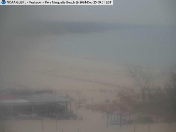 Wide view of Pere Marquette Beach in Muskegon with a beach house in the foreground. // Image captured at: 2024-12-25 14:51:01 UTC (about 12 min. prior to this post) // Current Temp in Muskegon: 33.06 F | .59 C // Precip: overcast clouds // Wind: N at 1.006 mph | 1.62 kph // Humidity: 76%