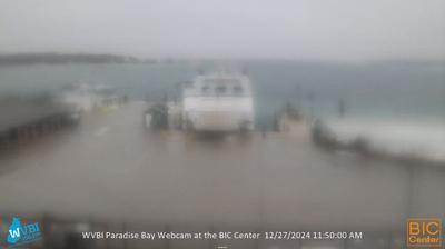 Security cam looking SSE over of the Beaver Island Ferry dock with Lake Michigan in the distance. // Image captured at: 2024-12-27 16:50:43 UTC (about 13 min. prior to this post) // Current Temp in Beaver Island: 41.32 F | 5.18 C // Precip: light rain // Wind: SE at 6.912 mph | 11.12 kph // Humidity: 93%