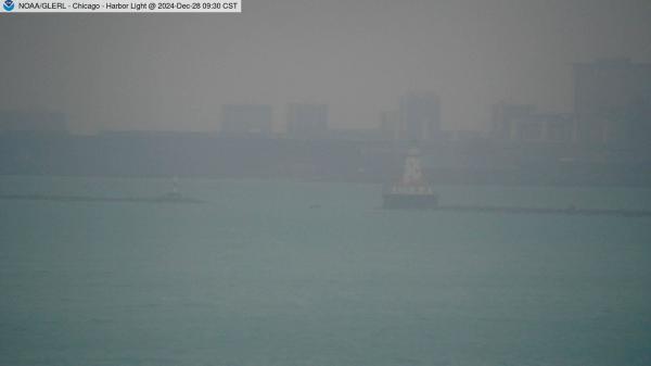 View of the Chicago Harbor Lighthouse from one of the cribs located in Lake Michigan. // Image captured at: 2024-12-28 15:30:01 UTC (about 3 min. prior to this post) // Current Temp in Chicago: 47.80 F | 8.78 C // Precip: scattered clouds // Wind: SSW at 11.990 mph | 19.29 kph // Humidity: 85%