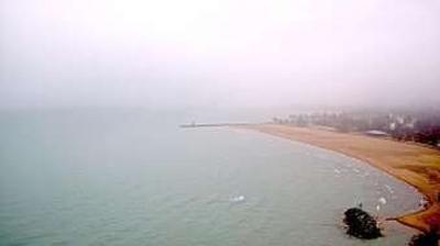 Webcam on a lakeshore highrise in Edgewater looking south over Osterman Beach and Chicago loop in distance. // Image captured at: 2024-12-29 16:28:05 UTC (about 4 min. prior to this post) // Current Temp in Chicago: 42.81 F | 6.01 C // Precip: heavy intensity rain // Wind: N at 1.990 mph | 3.20 kph // Humidity: 95%