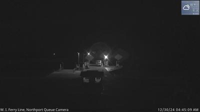 A small security building in the foreground leading into the Liberty Grove ferry docking area and Lake Michigan in the background. // Image captured at: 2024-12-30 10:46:24 UTC (about 16 min. prior to this post) // Current Temp in Liberty Grove: 32.37 F | .21 C // Precip: scattered clouds // Wind: NW at 8.053 mph | 12.9 kph // Humidity: 100%