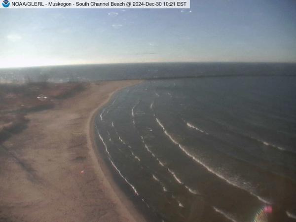 View above South Channel Beach in Muskegon as it meets Lake Michigan. // Image captured at: 2024-12-30 15:21:01 UTC (about 12 min. prior to this post) // Current Temp in Muskegon: 41.72 F | 5.40 C // Precip: few clouds // Wind: W at 9.216 mph | 14.83 kph // Humidity: 78%