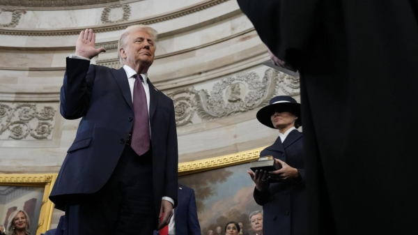 Trump broke with another tradition: He did not place his left hand on the two Bibles first lady Melania Trump was holding.

Video and photos show that Trump recited the oath from Roberts without placing his hand on the Lincoln Bible, first used to swear in the 16th U.S. president, and a Bible his mother gave him in 1955. (Trump used the same texts at his 2017 inauguration.)